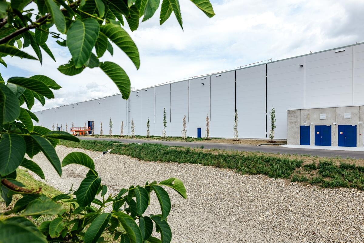 Helicopters helped build the hall. It will now produce cooling equipment